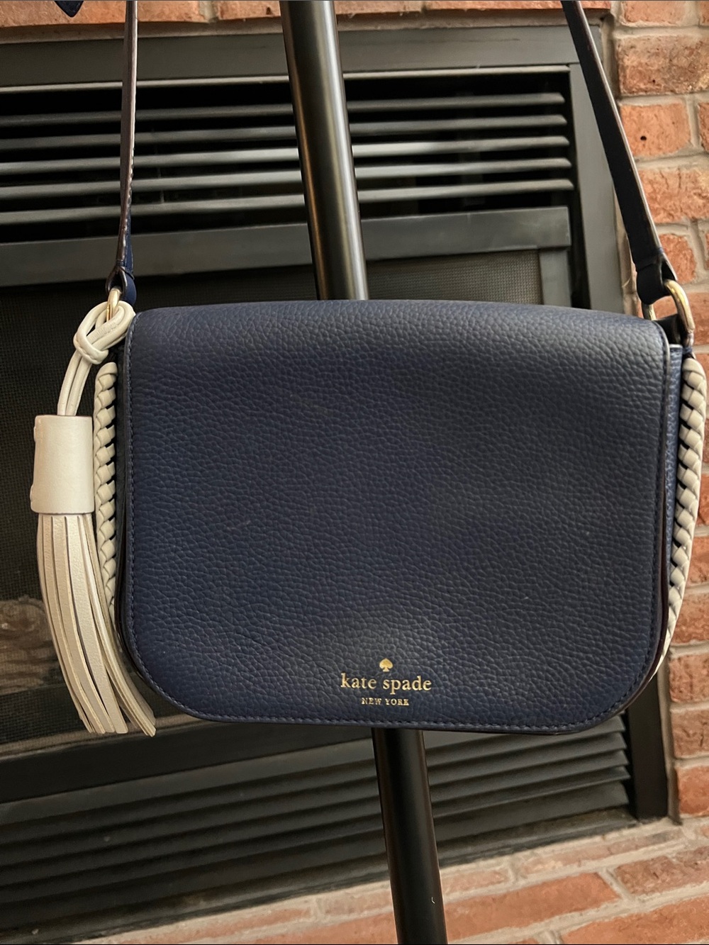 kate spade navy crossbody bag with cream tassel